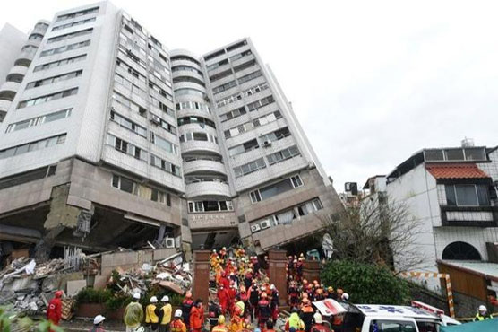 Rescuers brave aftershocks to pull bodies from tilting Taiwan tower