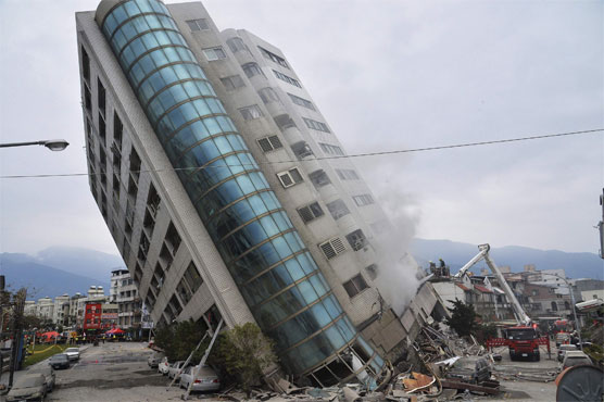 Taiwan demolishes quake-hit buildings as rescue efforts intensify