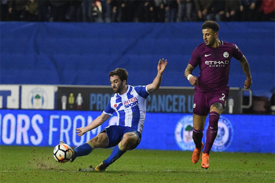 Wigan end Man City quadruple bid with Cup shock