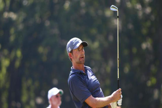 Golf: Noren, Simpson lead as Woods 'pleased' with even par 70