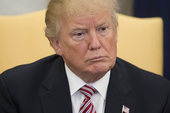 Trump says armed deputy at Florida school was a coward