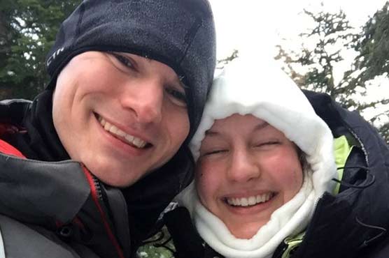Warm hearts, subzero temps: Couple gets engaged on mountain