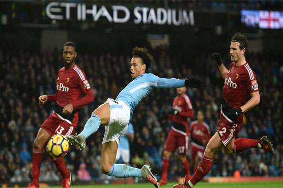 Football: City take express route as leaders sink Watford