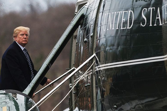 Trump scrambles as racist slur fuels outrage