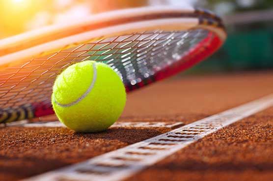 Tennis: Teen sensation bows out with lesson from 'god'