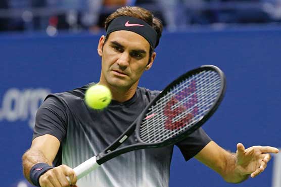 Tennis: Federer says get on with it as Open defends heat policy