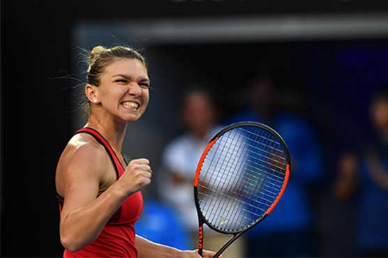 Tennis: Top seed Halep endures marathon to reach last 16
