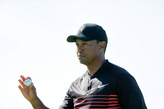 Golf: Woods makes cut with closing birdie at Torrey Pines