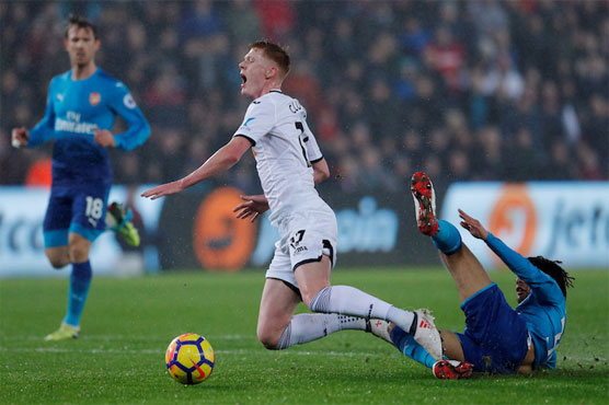 Arsenal crash as Clucas double lifts Swansea