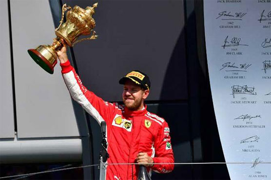 Vettel wrecks Hamilton's home party with stunning Ferrari win