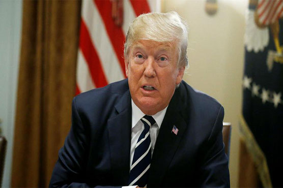 Under fire, Trump says he misspoke on Russia election meddling