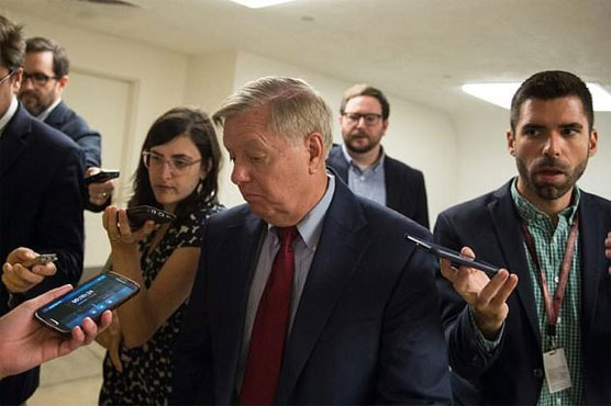 Republicans mull curbing Trump after Putin summit