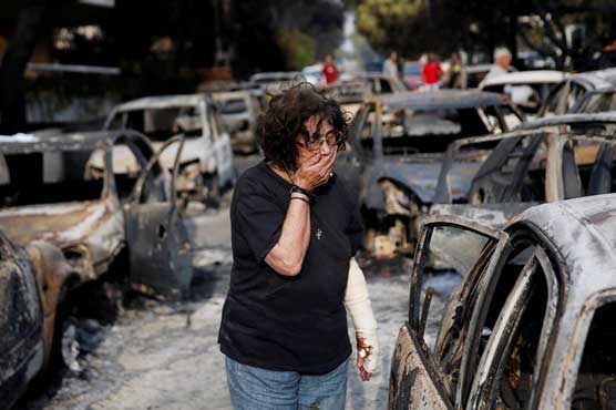 Greece to start burying wildfire victims, government facing criticism