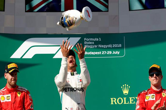 Hamilton wins in Hungary to build championship lead
