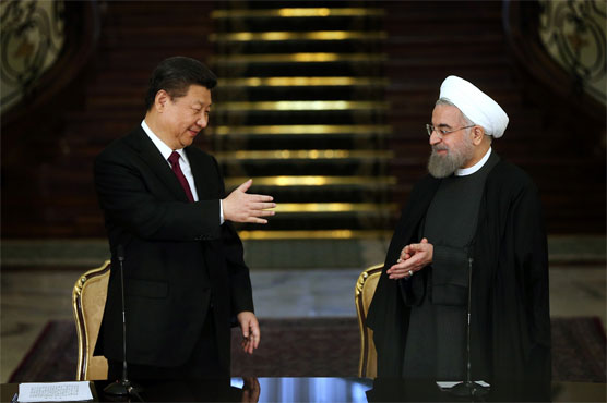 China's Xi backs nuclear deal in talks with Iran leader