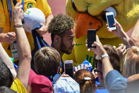 Neymar is star attraction as fans swarm to Brazil training