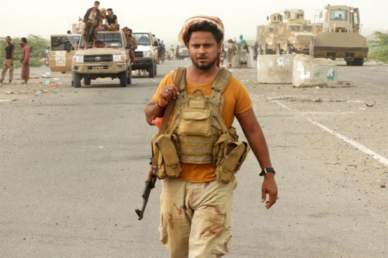 Dozens dead in battle for key Yemen port