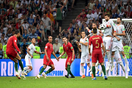 Ronaldo hits hat-trick as Portugal deny Spain in World Cup classic