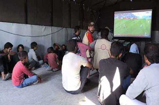 Displaced Syrians find relief in tent-side World Cup screenings