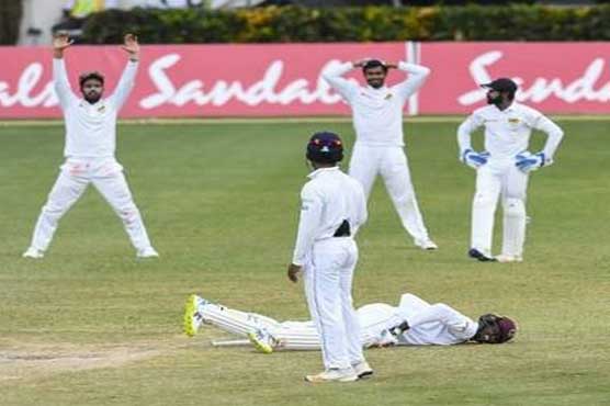 Chandimal sweats as Sri Lanka and West Indies draw 2nd Test