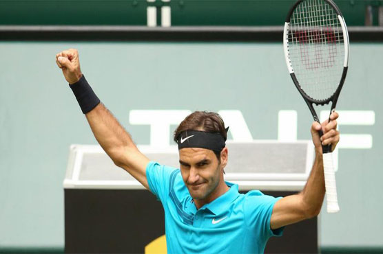 Federer holds off Ebden to reach Halle semi-finals