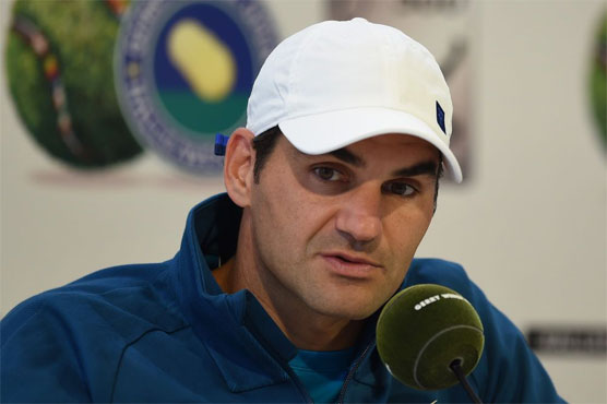 Federer eyes ninth Wimbledon title but wary of Nadal threat