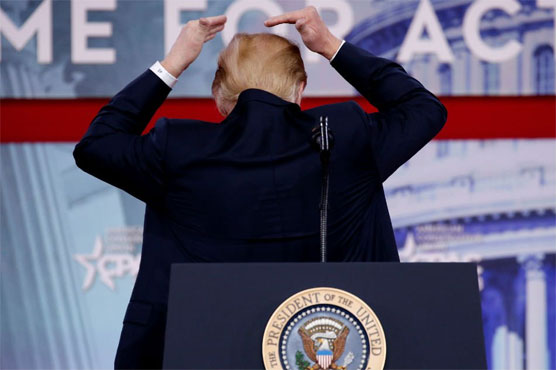 Trump boasts of quality mane