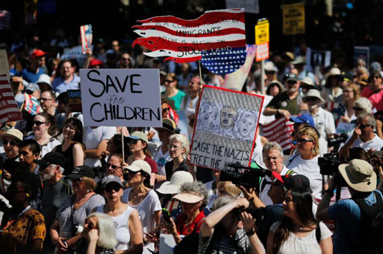 Thousands in US march against immigration policy