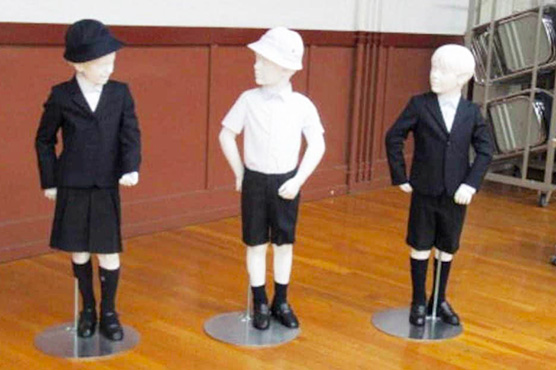 Tokyo school hires guards after Armani uniform furore