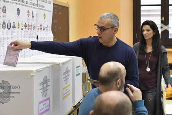 Italy votes in uncertain election stalked by populism