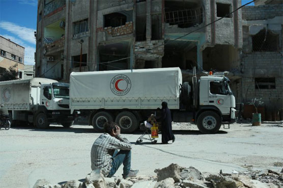 Aid reaches Syria's Ghouta as strikes hit rebel enclave