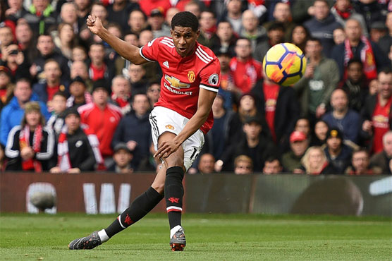 Rashford hits a brace as Man Utd hold off Liverpool