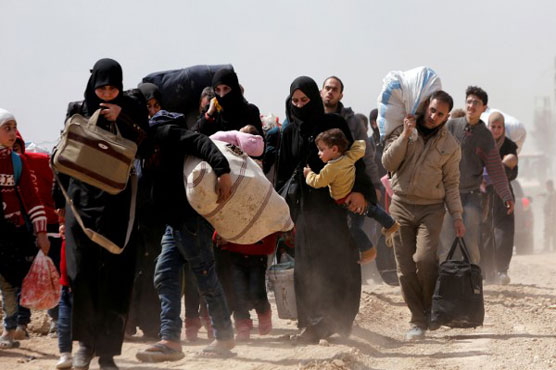 Thousands flee Syria rebel enclave after month-long bombardment
