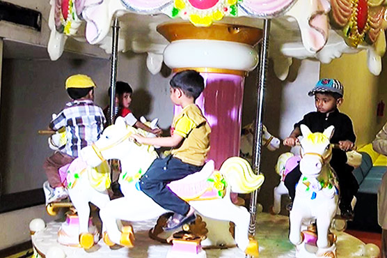 Karachi jail administration takes children of women prisoners on a trip to joy land 