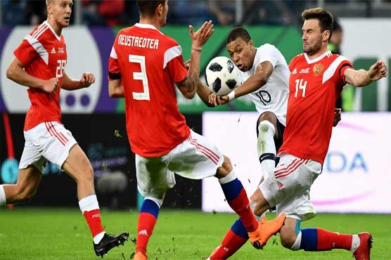 Mbappe shines as France cruise past Russia