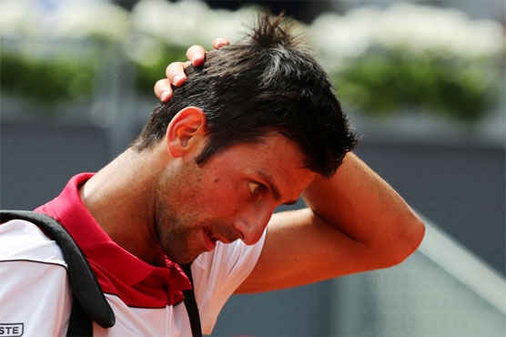 Djokovic dumped out of Madrid Open by Britain's Edmund