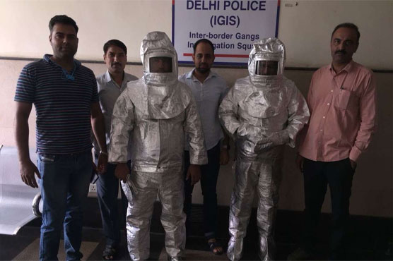 Delhi police parade 'space suit' scammers after NASA claims exposed
