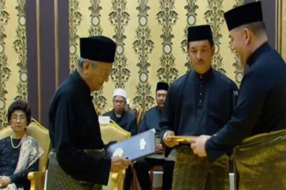 Malaysia's Mahathir sworn in as world's oldest leader after shock poll win