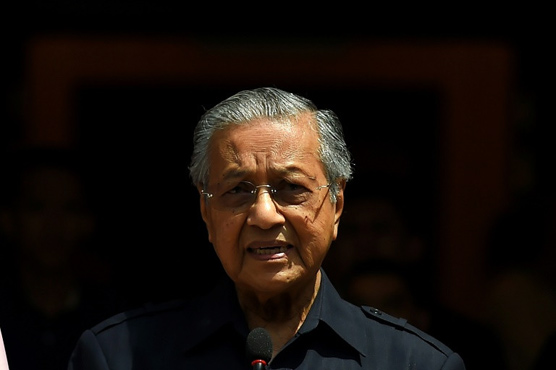 Malaysia's Mahathir gets down to work after historic poll win
