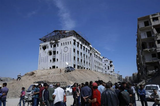 IS begins quitting last pocket of Syria's capital