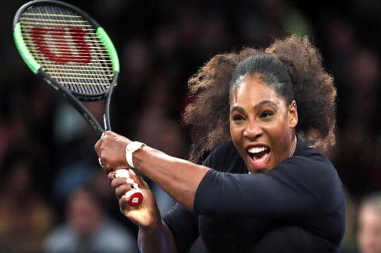 Wedding belle Serena sounds French Open alarm for rivals