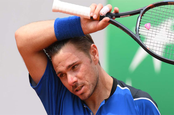 Wawrinka crashes, Djokovic through as rains halts Nadal and Sharapova