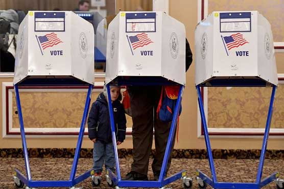 Trump on trial as Americans vote in midterm election