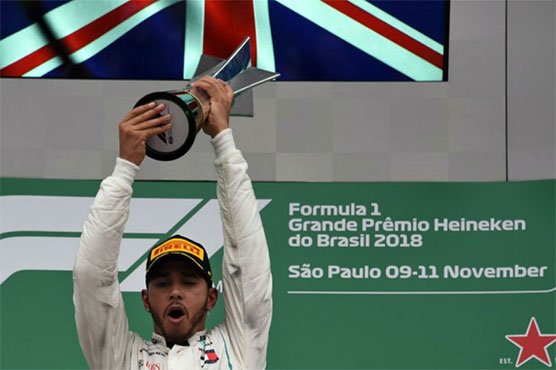 Hamilton wins nail-biting Brazilian GP, Mercedes take constructors