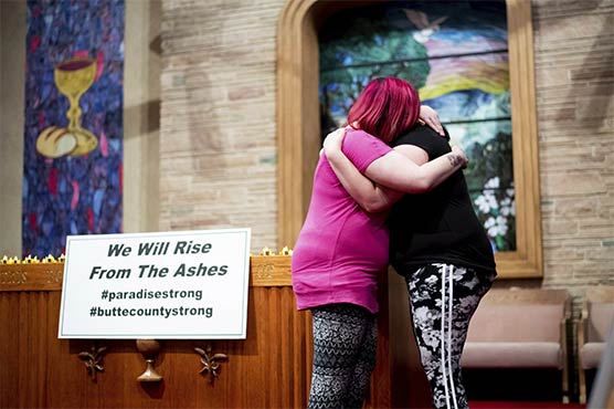 Victims mourned as toll hits 77 in California wildfire