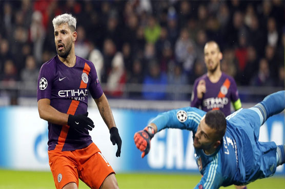 Aguero rescues draw at Lyon as Man City reach last 16