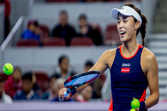 Wang on brink of year's biggest win as rain stops play