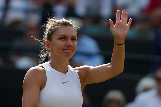 Top-ranked Halep out of WTA Finals with back injury