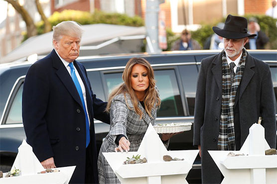 Trump visits Pittsburgh synagogue after shooting, protesters cry foul