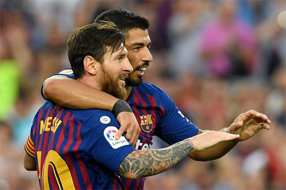 Magical Messi, Suarez hit doubles in 8-2 rout of Huesca